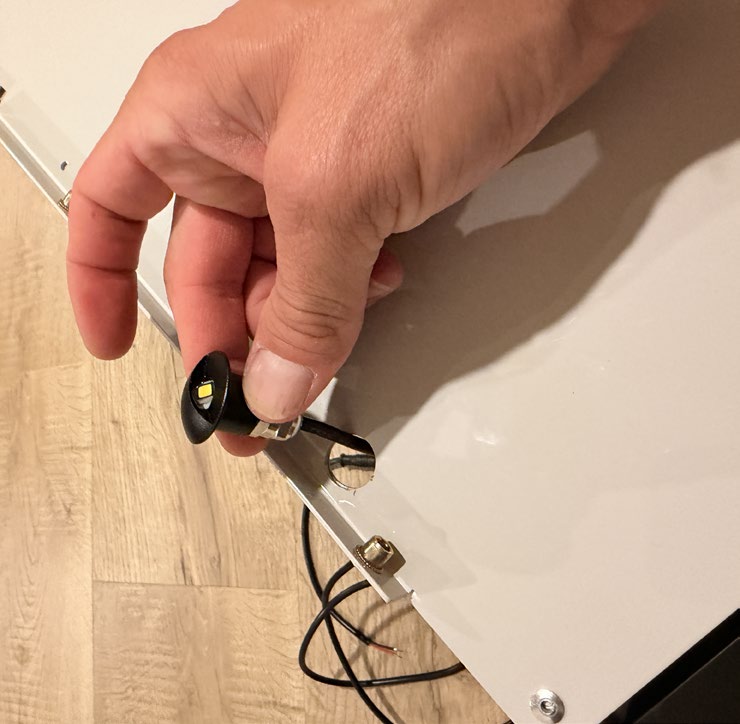 Feed wires through hole, then LED module